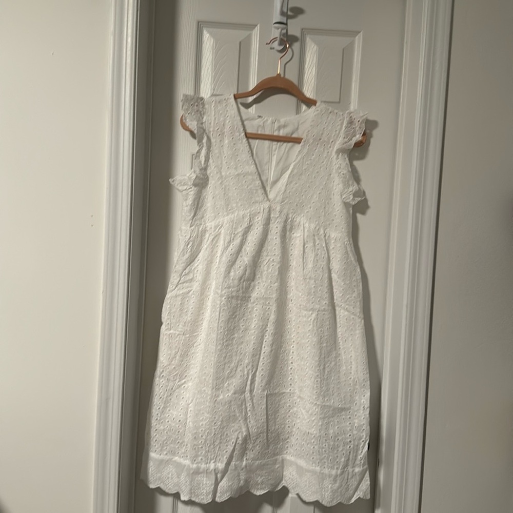 Aumora fully lined mini dress.